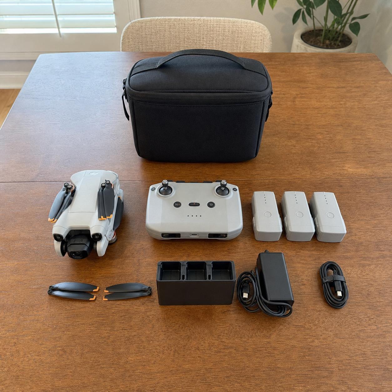 Sold like new DJI Mini 4 Pro Fly More Combo photographed by the seller